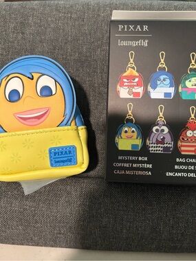 Pixar Loungefly Joy Emoji Mini Backpack Bag Charm - Yellow & Blue.  Inside out.